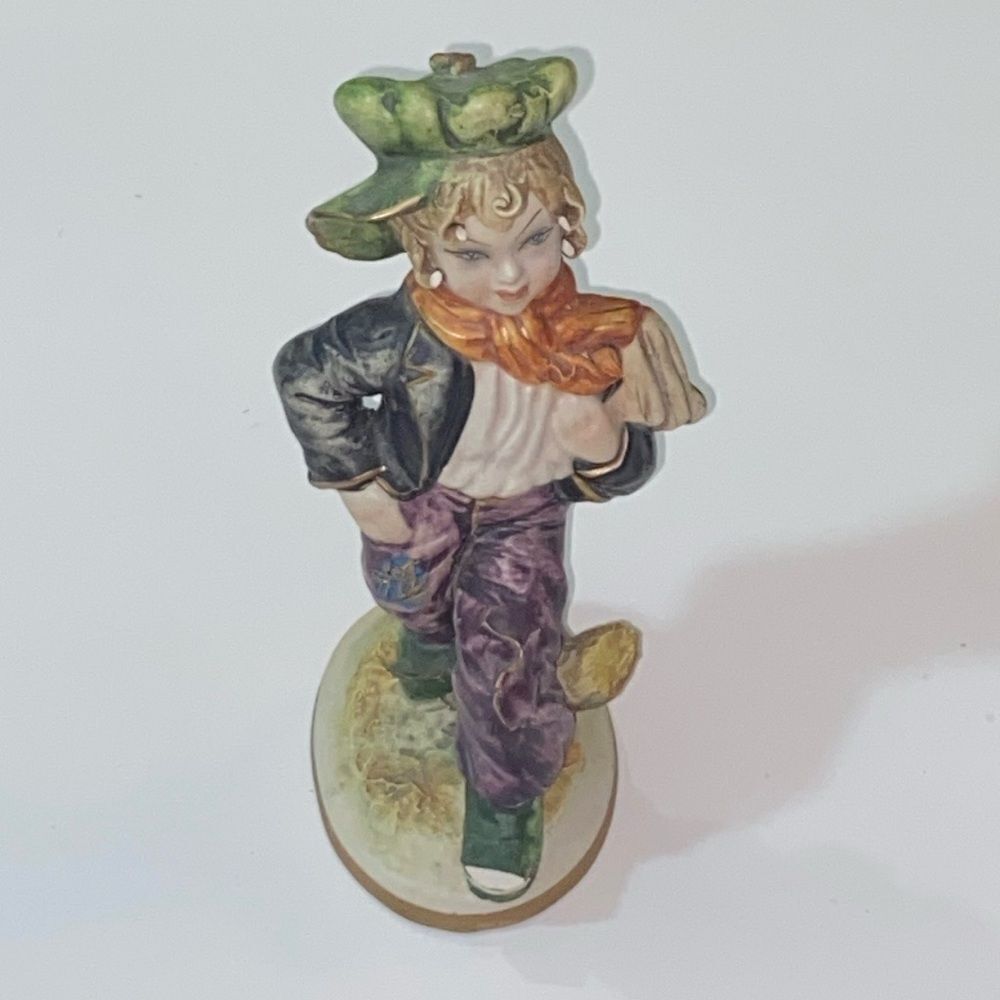 Vintage Colorful Porcelain Figurine with Green Hat